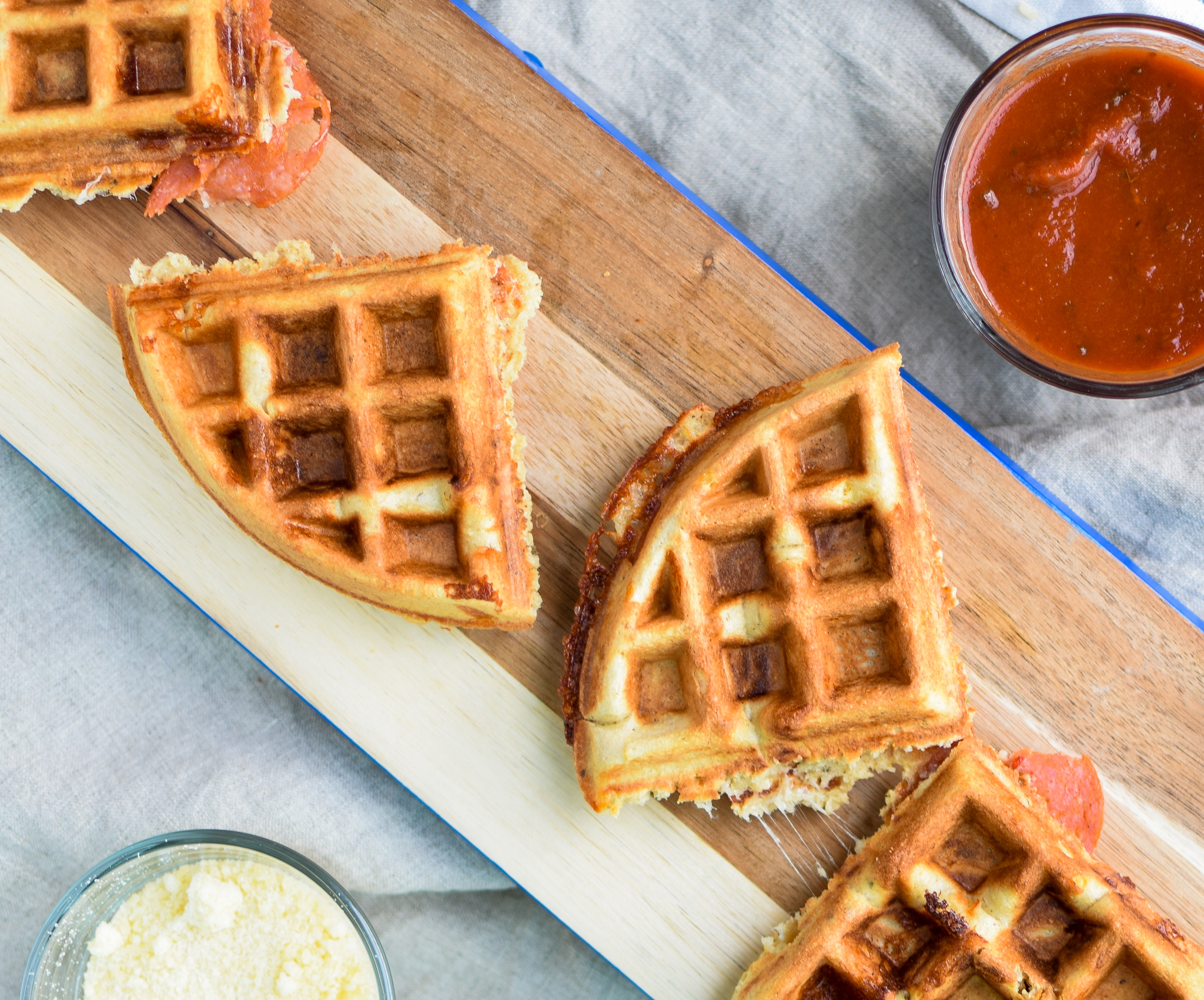 Protein Packed Pepperoni Pizza Waffles - Pizza + Waffles made super easy at home! Stuffed with mozzarella and pepperoni, plus packed with protein! - ProjectMealPlan.com