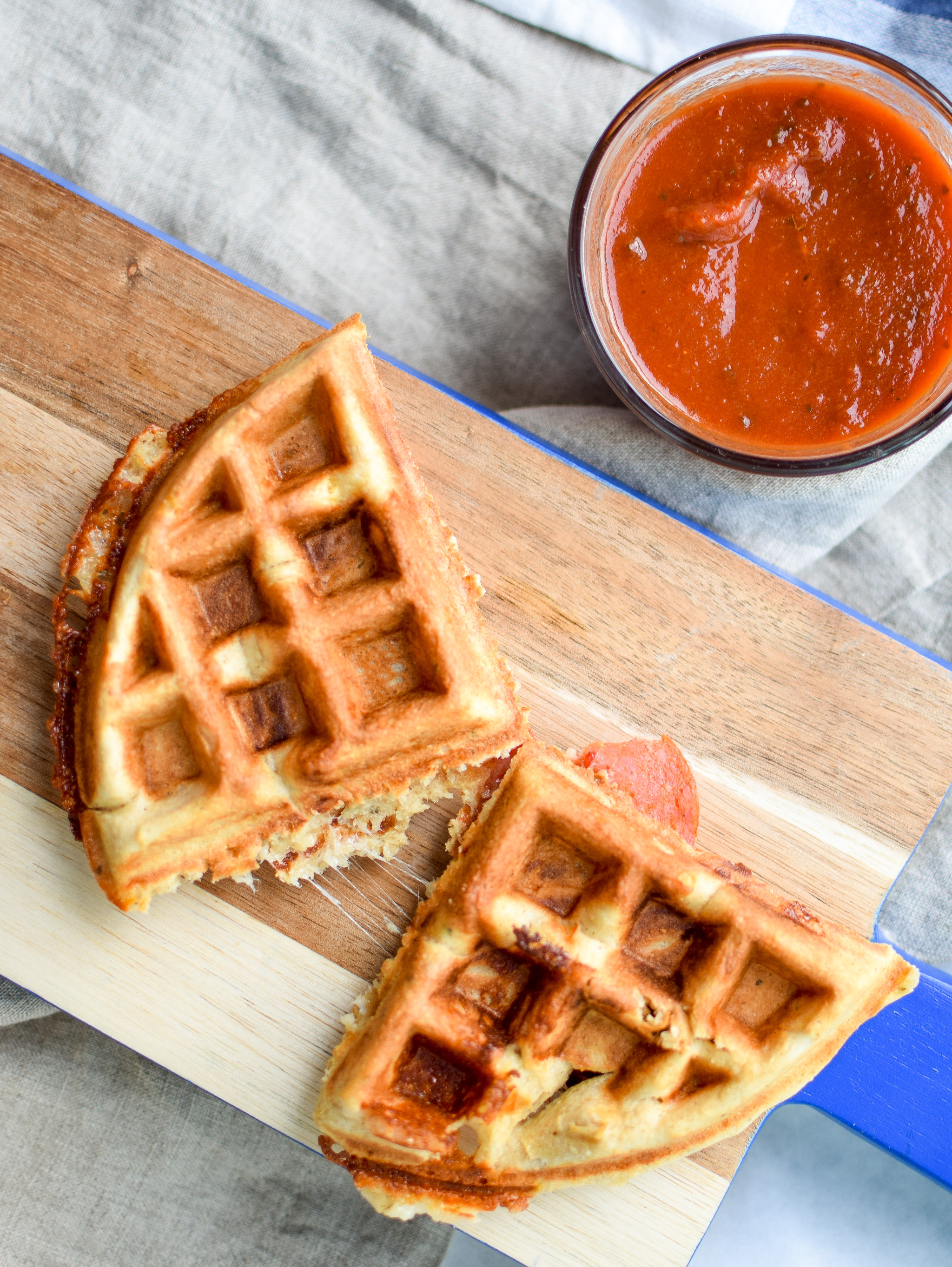 Pizza + Waffles made super easy at home! Stuffed with mozzarella and pepperoni, plus packed with protein!