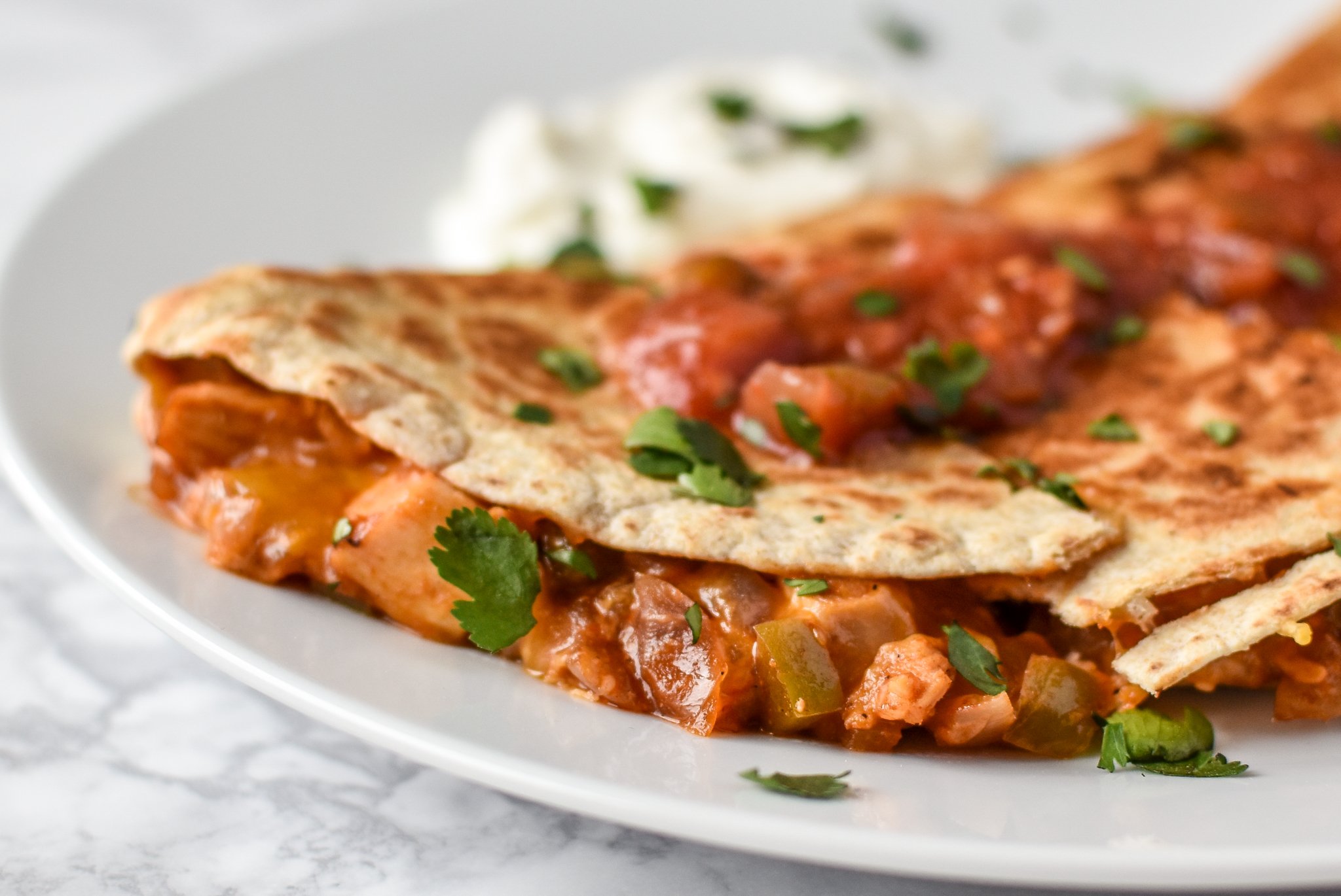 Quick BBQ Chicken Quesadillas (Make-Ahead Filling Recipe) - Delicious BBQ chicken quesadillas made in 10 minutes with pre-made filling! - ProjectMealPlan.com