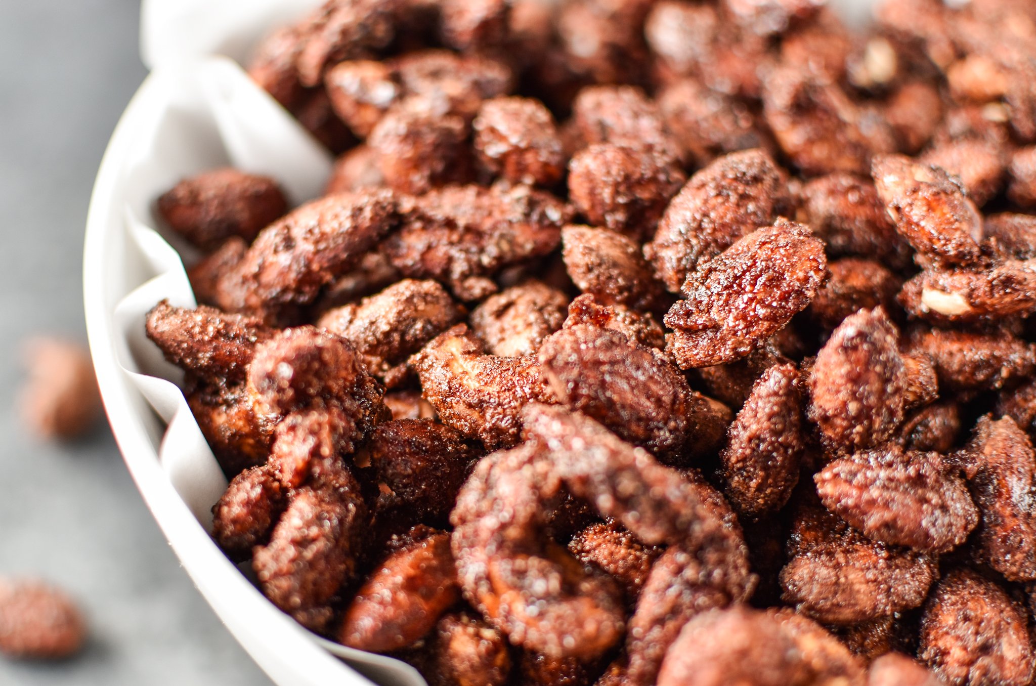 Peppermint Cocoa Roasted Nuts in a bowl, made with cashews and almonds! from ProjectMealPlan.com