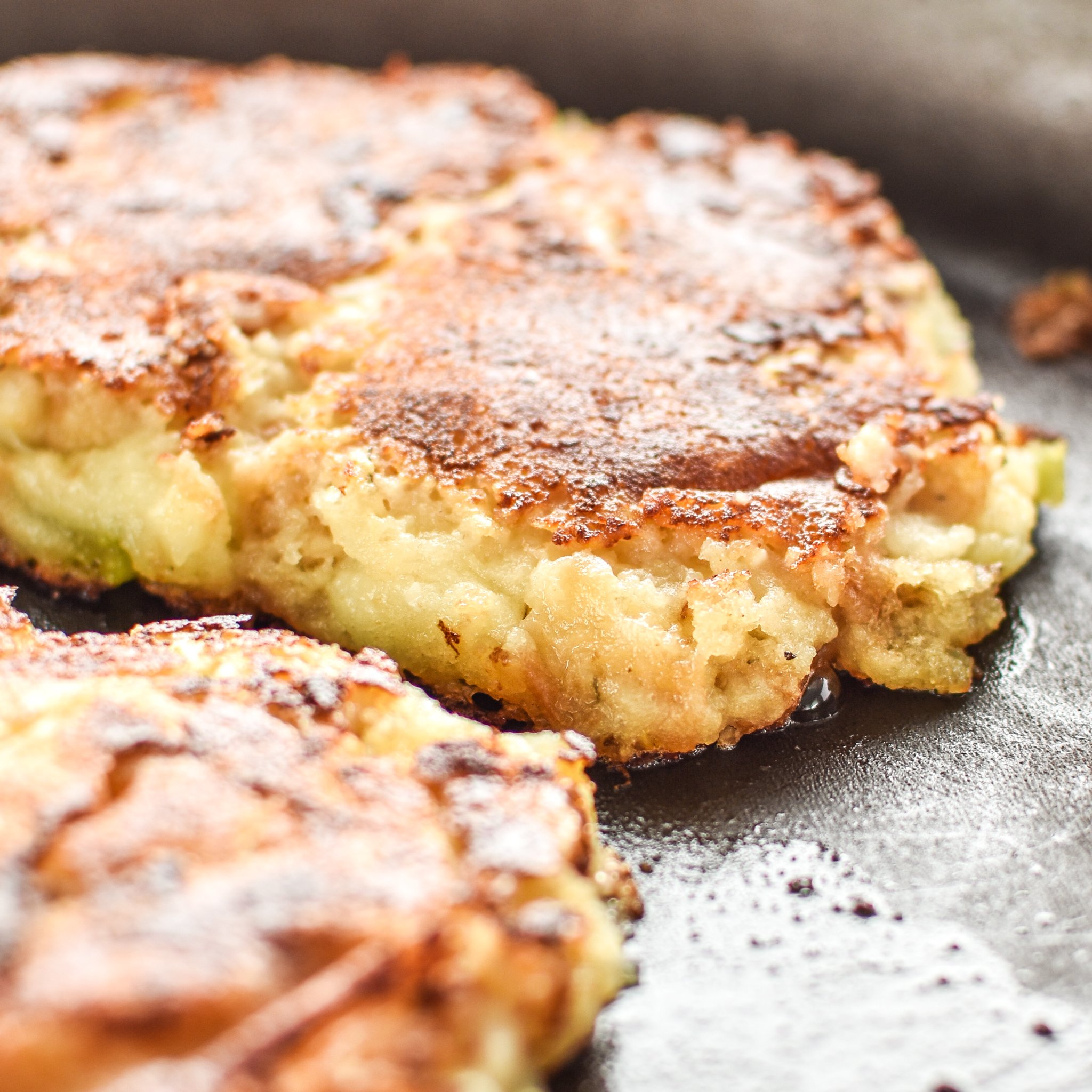 Mashed potato and stuffing pancakes in the frying pan