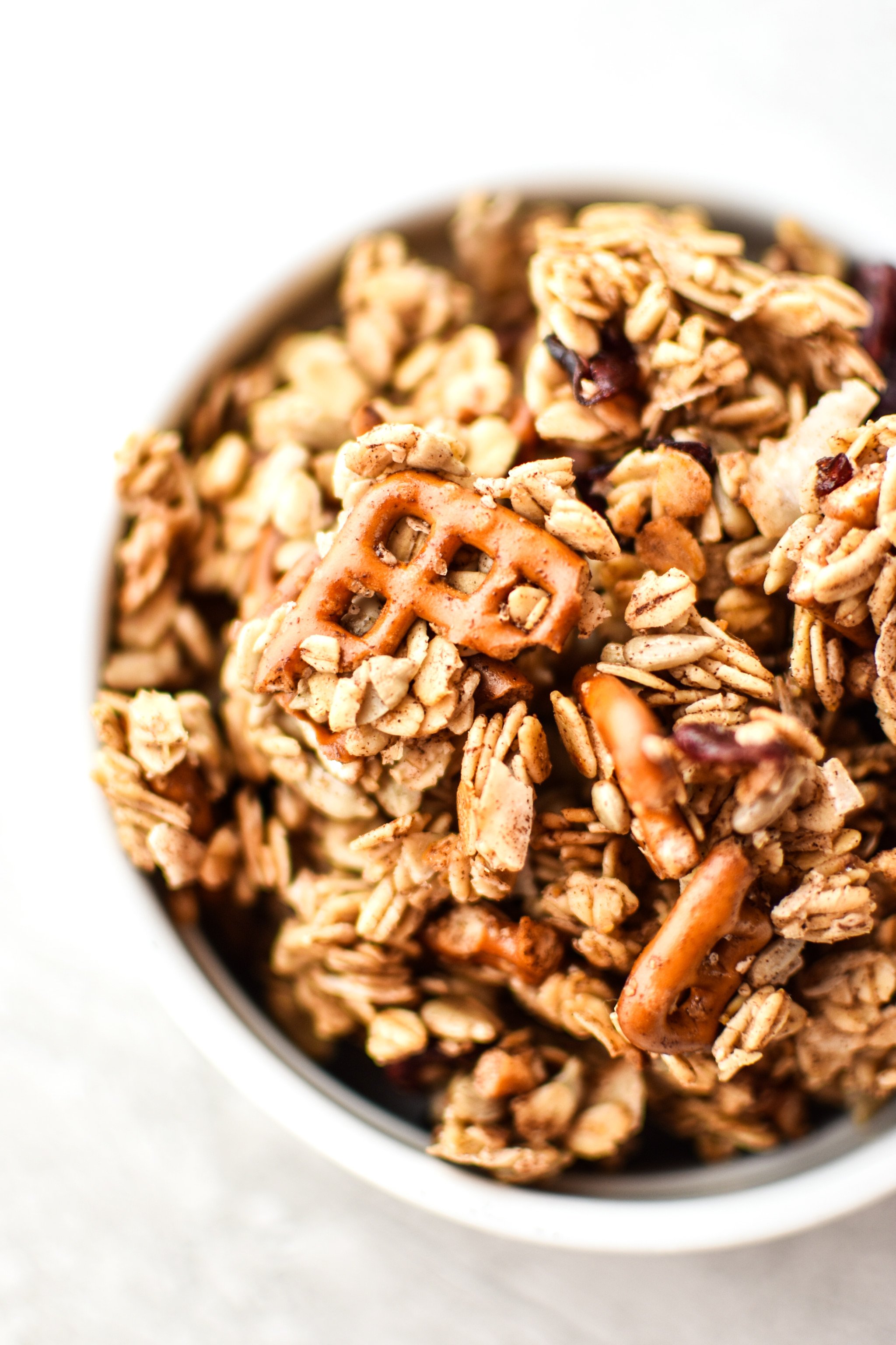 A bowl of super clumpy nut free snack mix granola.