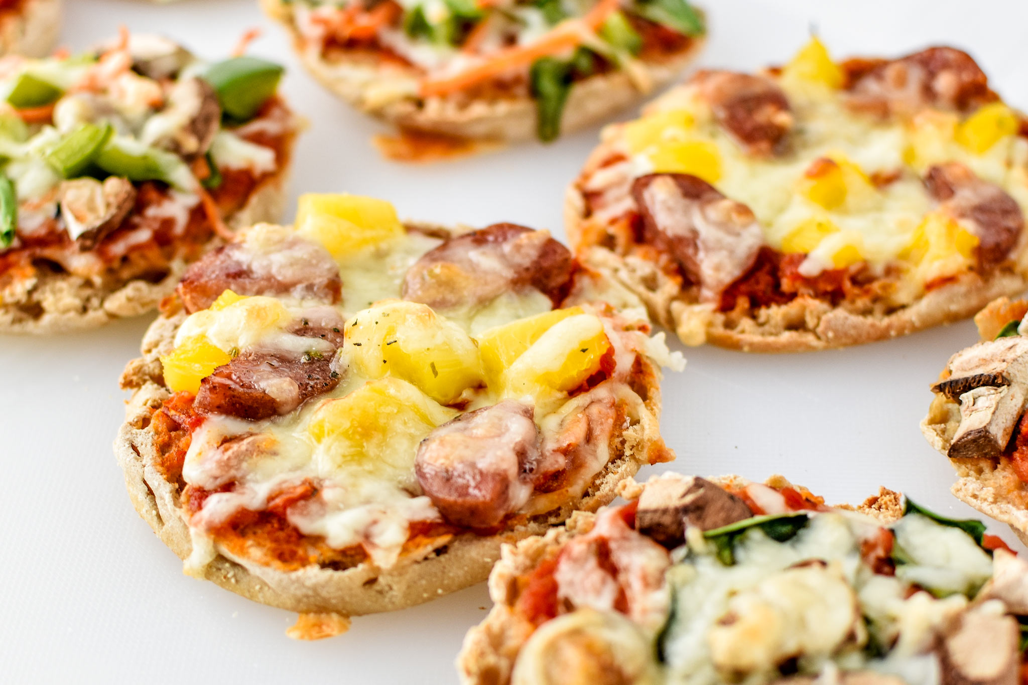 Meaty pineapple english muffin mini pizzas are perfect for cold lunch meal prep!