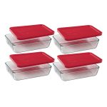 3 cup glass pyrex containers with red lids.