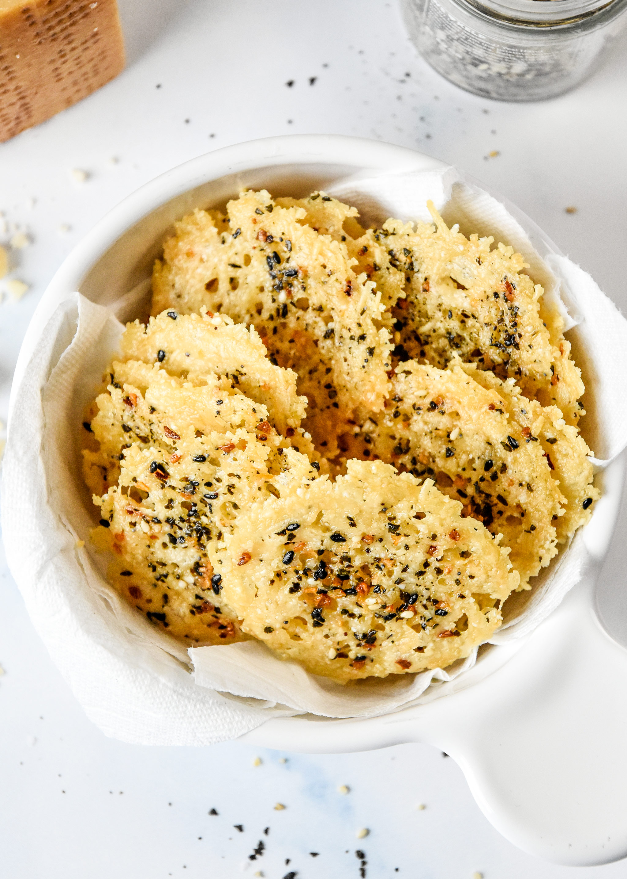 everything bagel baked parmesan crisps in a bowl ready for snacking