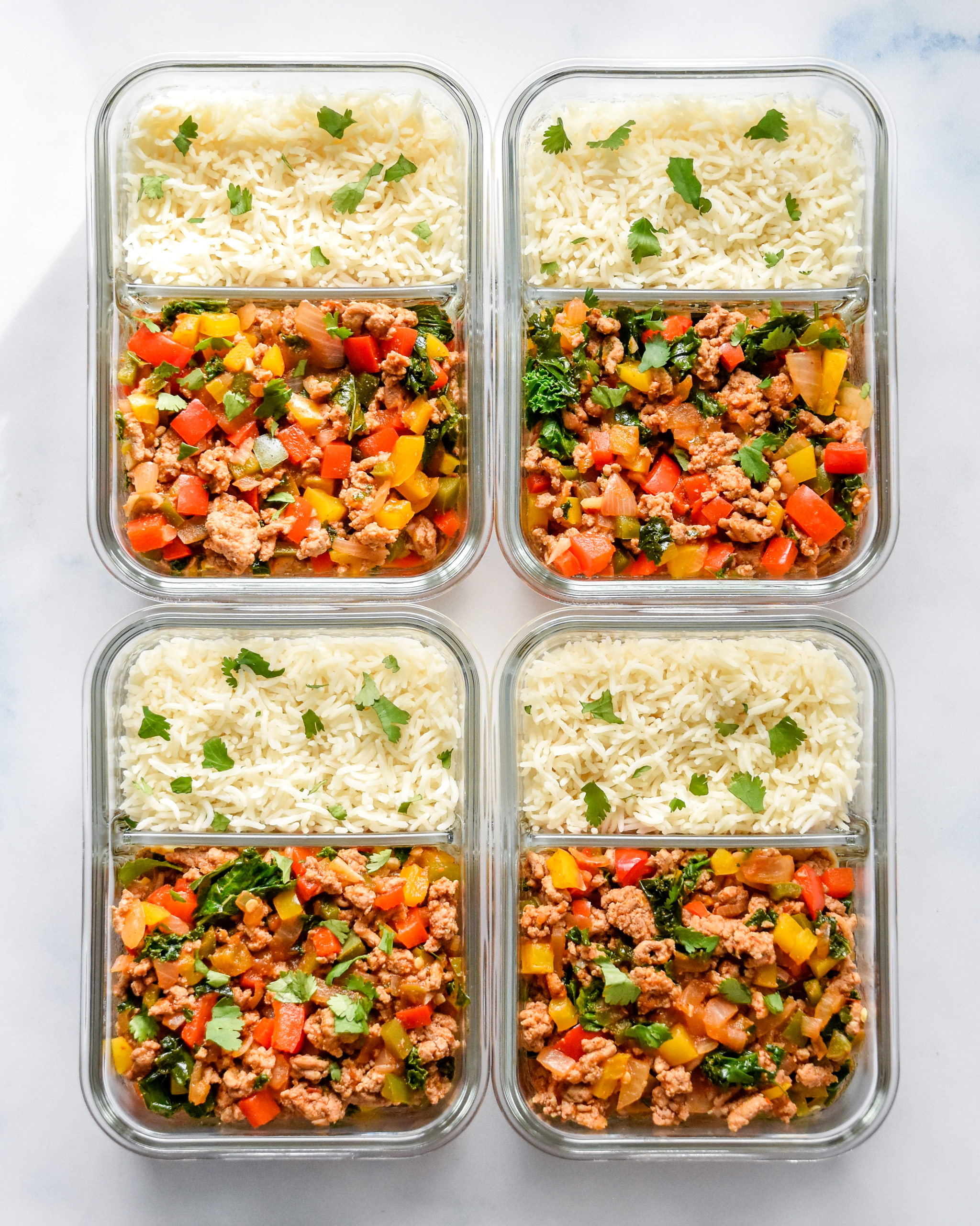 chipotle ground turkey skillet meal prep with rice in containers