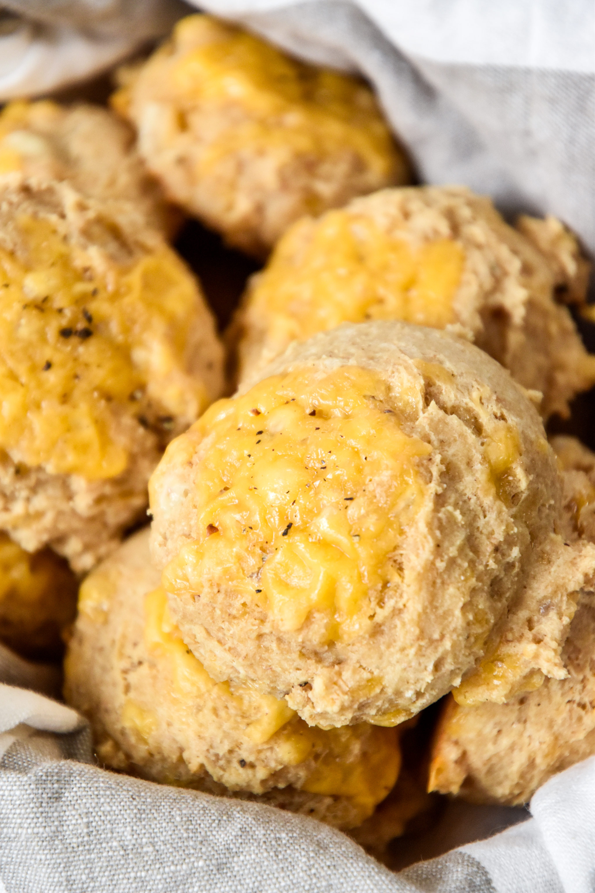 pancake mix cheddar drop biscuits in a basket.