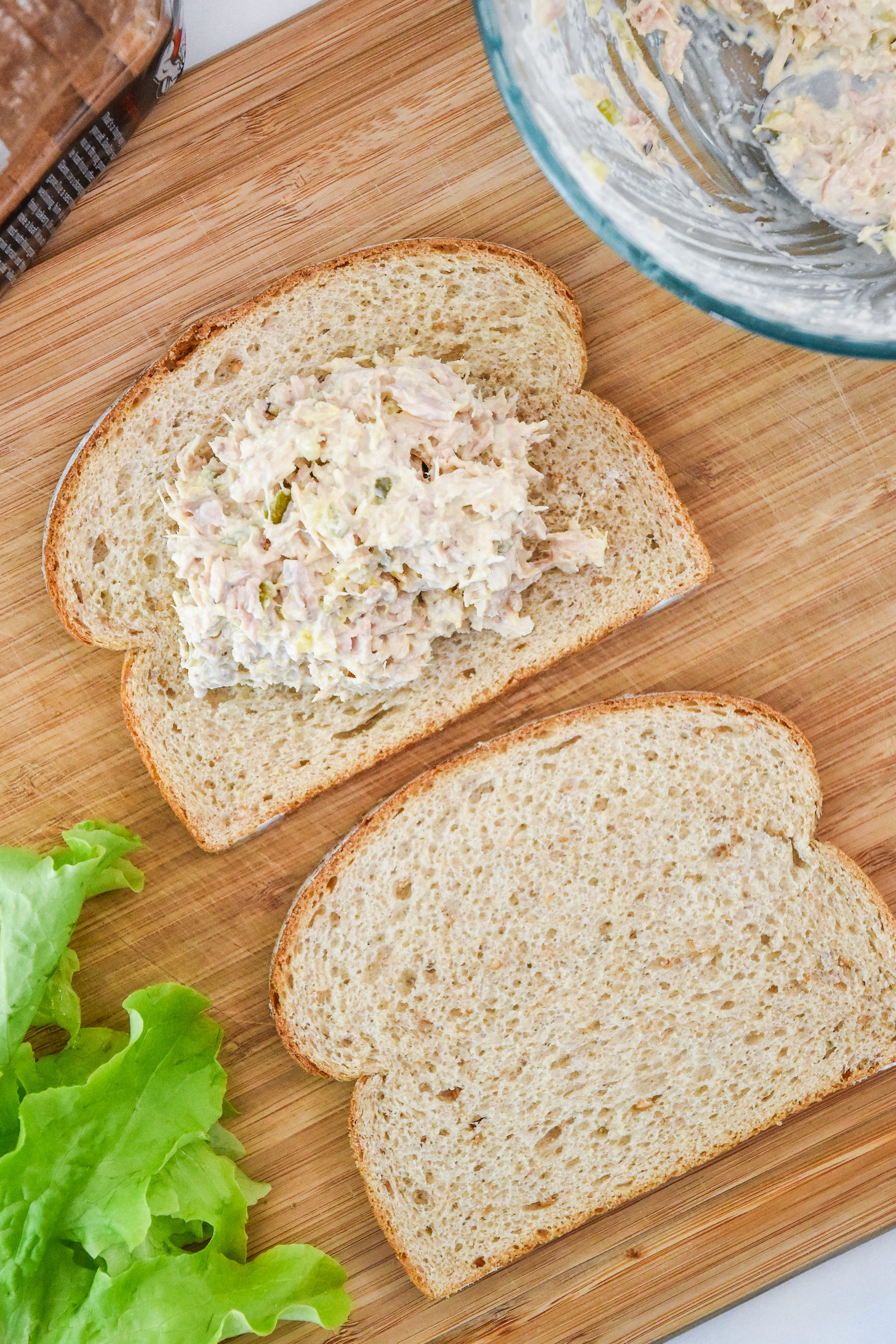 assembling a tuna sandwich with the no chop tuna salad.