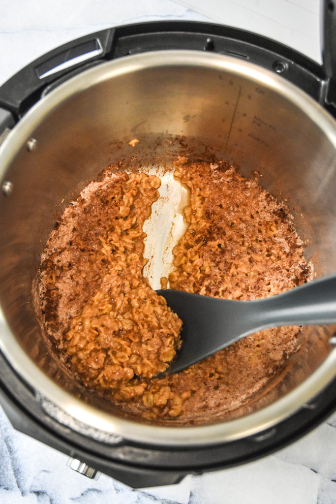 instant pot gingerbread oatmeal just cooked in the instant pot before stirring.