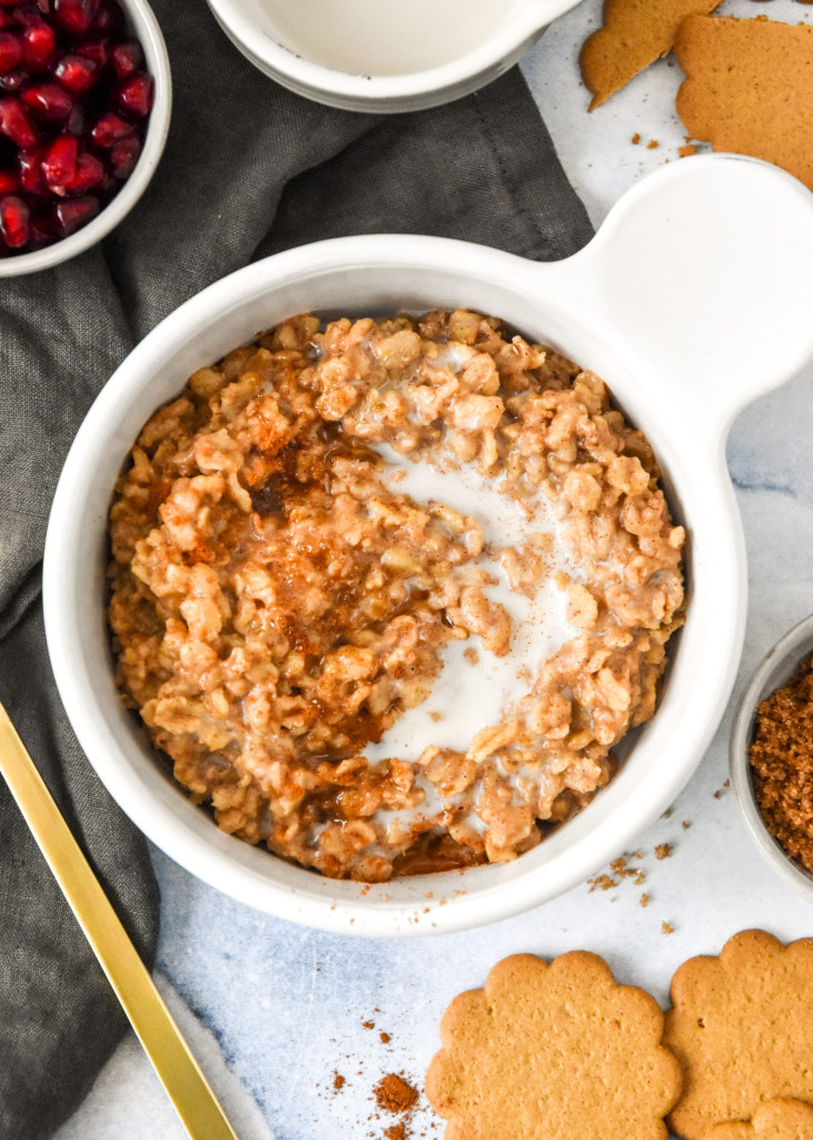 a bowl of instant pot gingerbread oatmeal made with rolled oats.