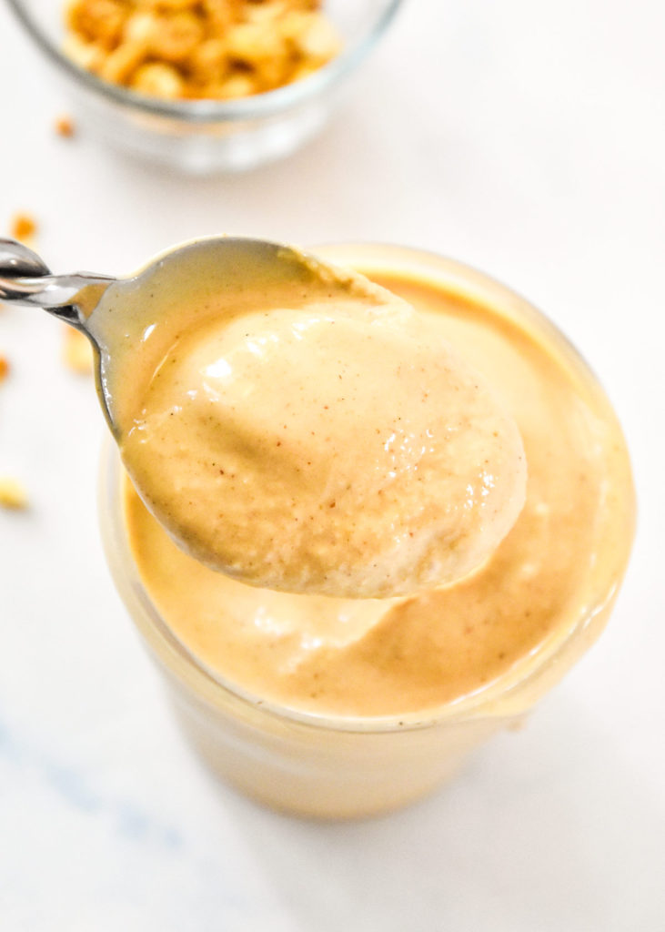 a spoonful of peanut butter powder milkshake.