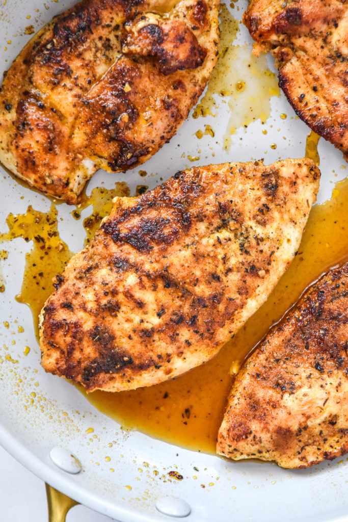 Thin Sliced Stovetop Chicken Breast just cooked in a nonstick pan.