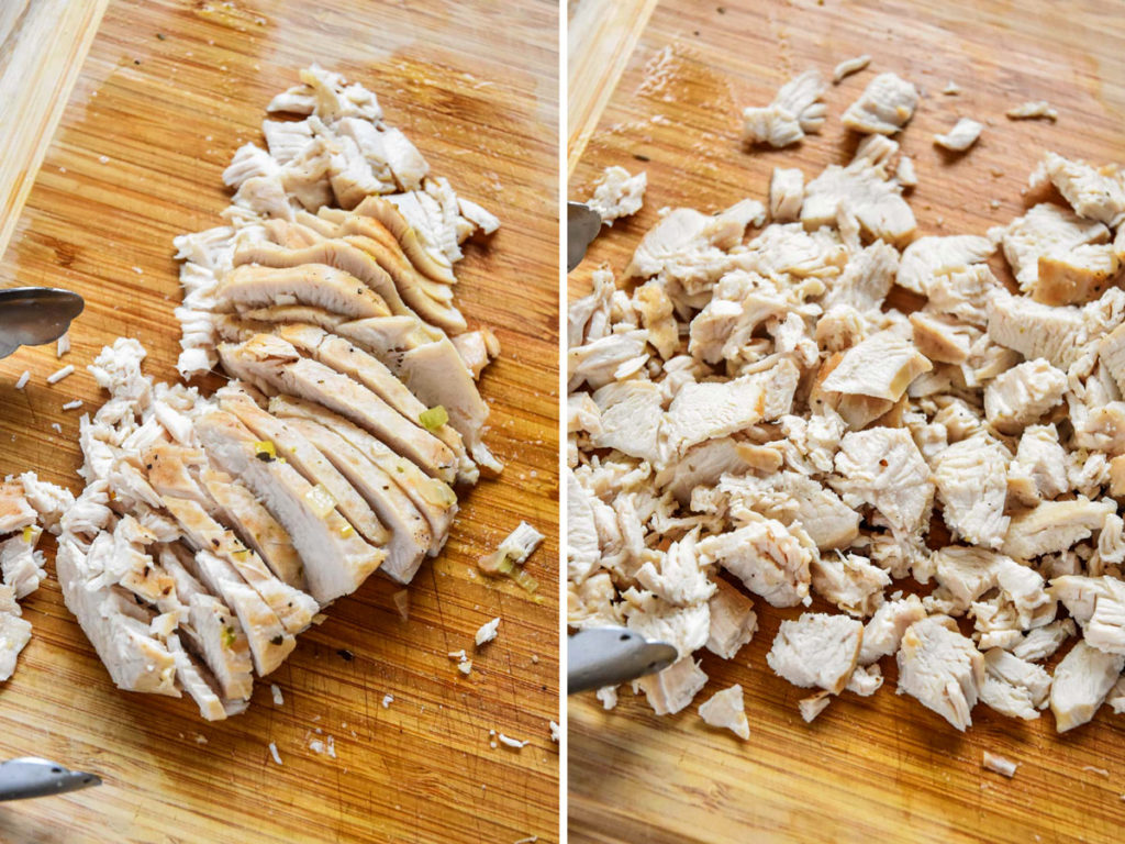 sliced and cut chicken breast on a wooden cutting board.