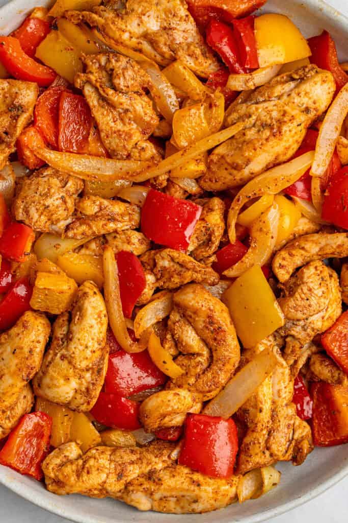 air fryer chicken fajitas cooked in a serving bowl.