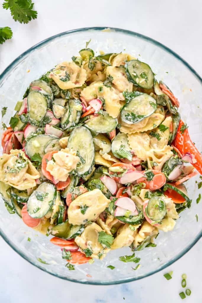 prepared banh mi inspired tortellini salad in a glass mixing bowl. 