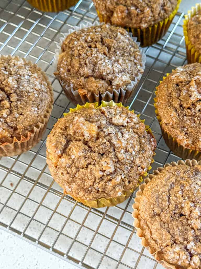 oatmeal applesauce blender muffins on a wire cooling rack.